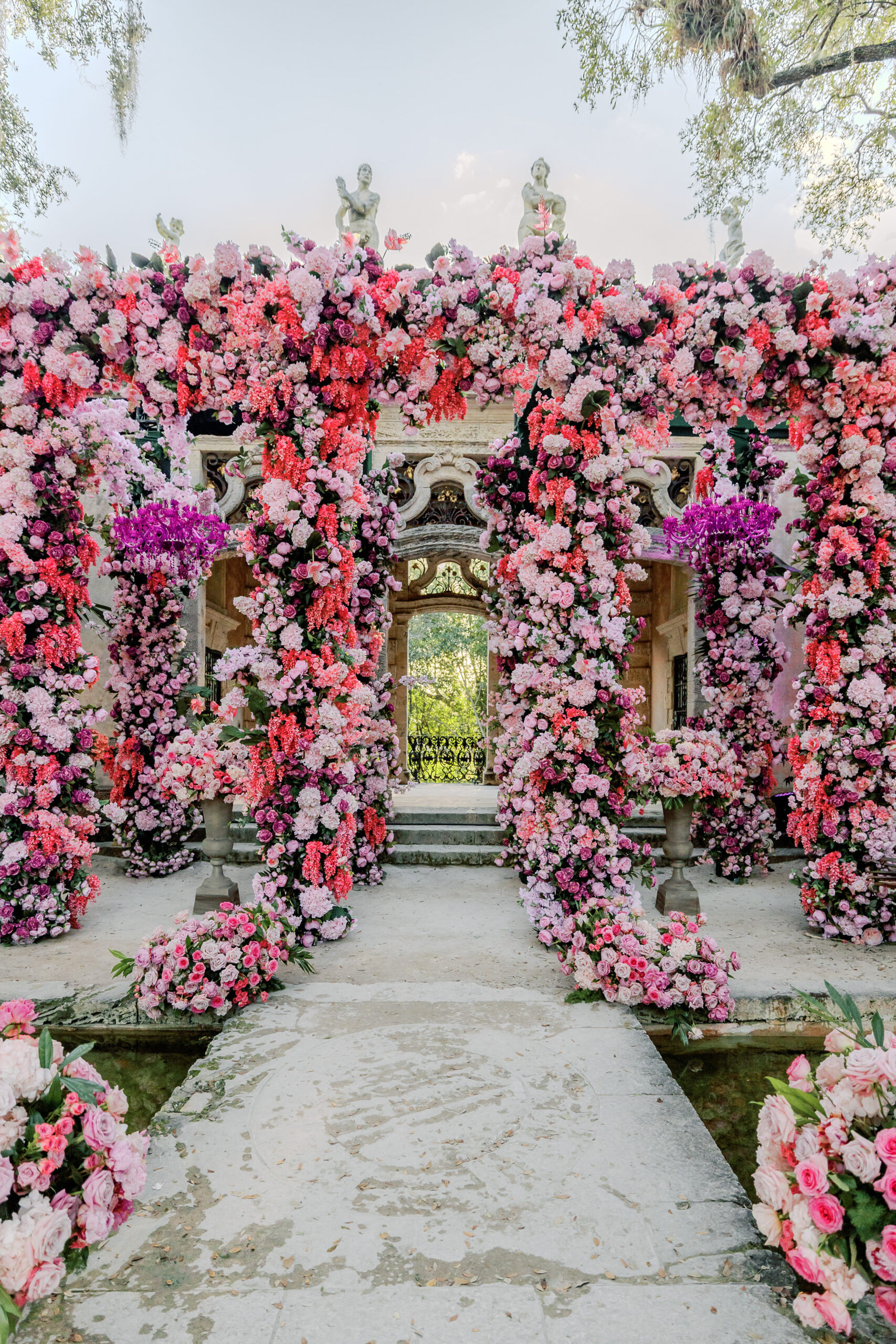 Floral arch at Vizcaya - Flowers by Semia