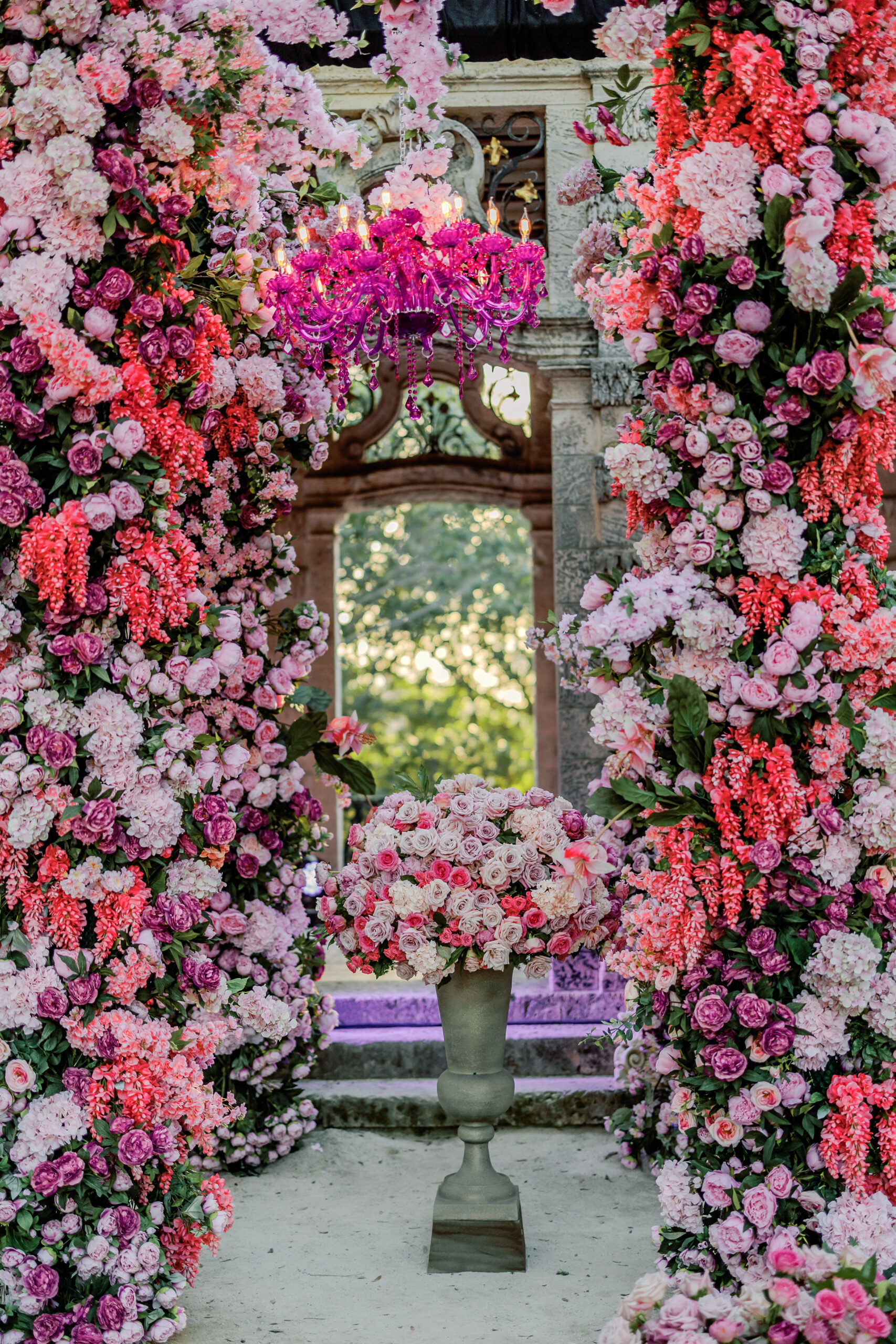 Ceremony floral arch with chandelier detail by Flowers by Semia