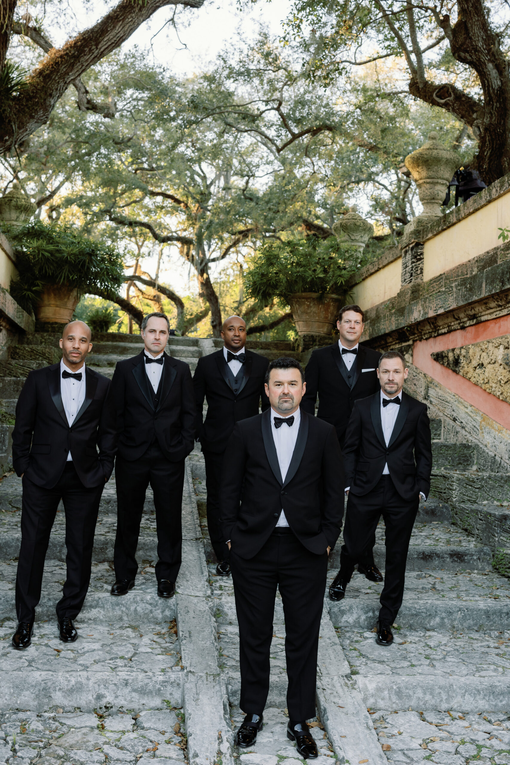 Groom Ross Chouest with groomsmen on Vizcaya steps