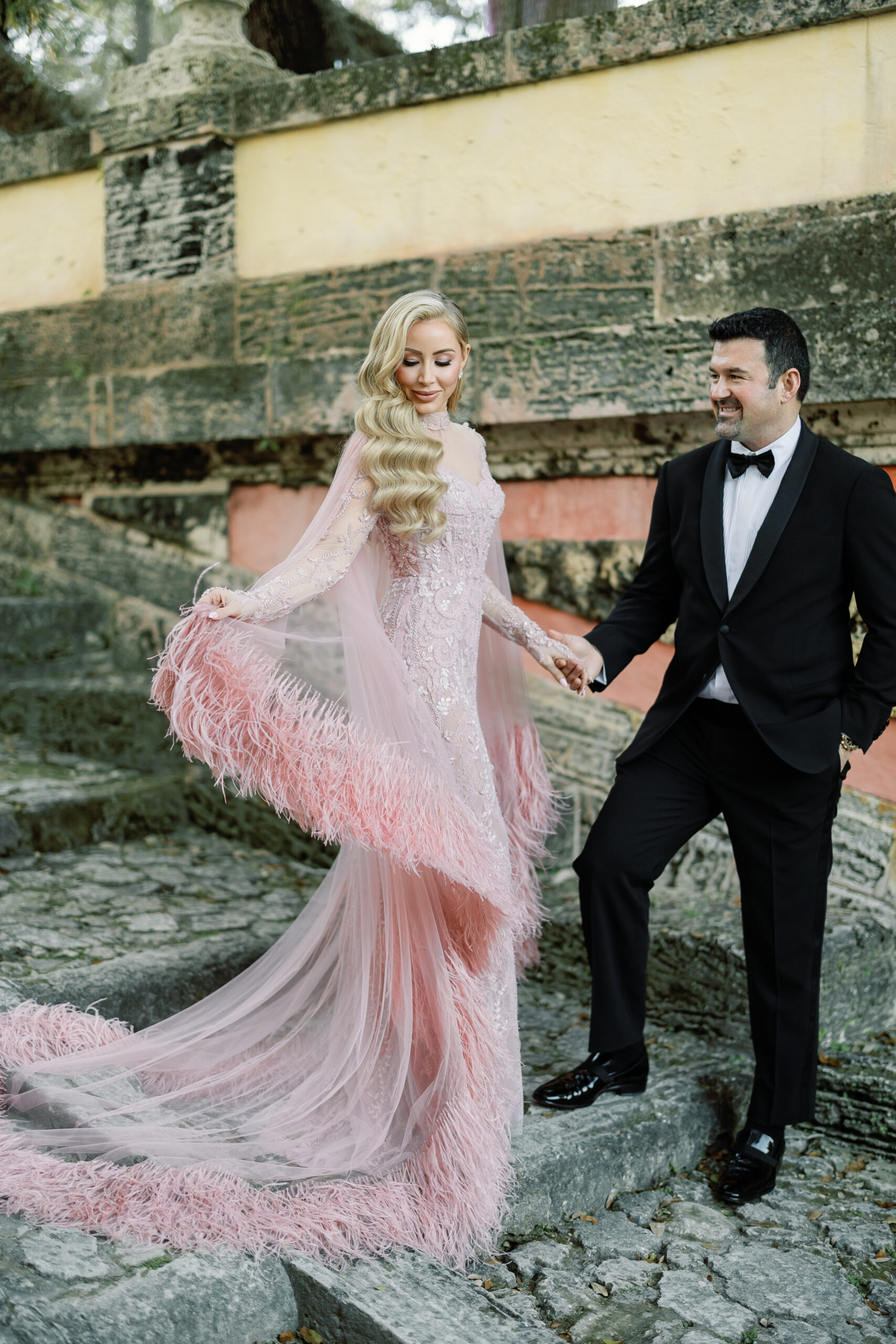Bailey and Ross portrait on cobblestone steps at Vizcaya