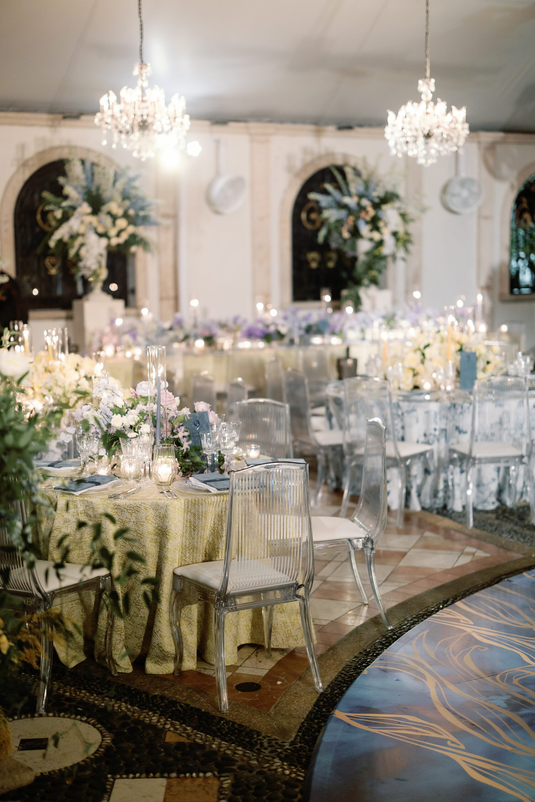 Reception ballroom at Vizcaya with chandelier and tablescape